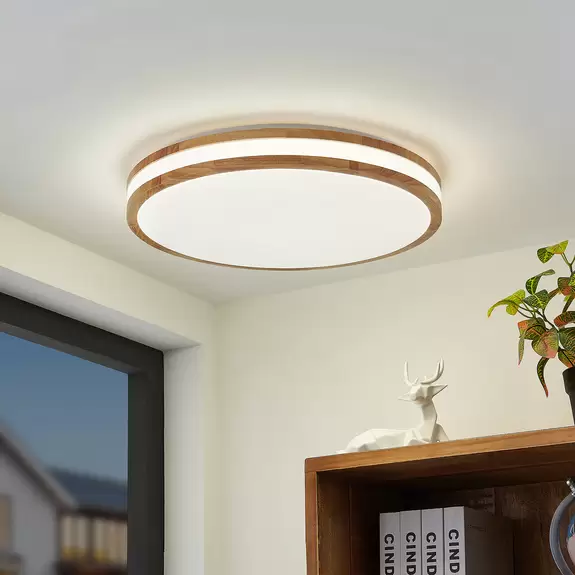 Lampenwelt Lindby LED-Deckenlampe Emiva, Lichtquelle mittig, CCT, Holz Fabrikladen